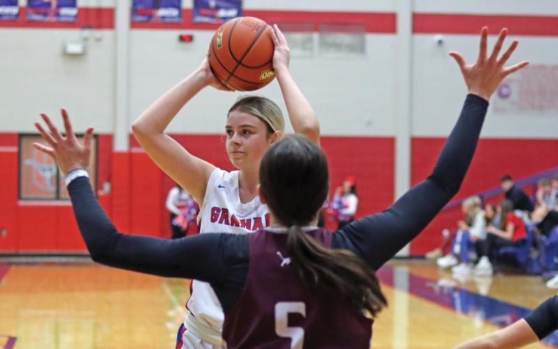 (THOMAS WALLNER | THE GRAHAM LEADER) Fayth Bryer looks for an open teammate while Brownwood defenders look to take possession of the ball during the matchup Friday, Jan. 31.