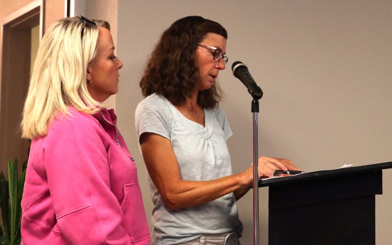 (ARCHIVE PHOTO | THE GRAHAM LEADER) Humane Society of Young County President Heather Allen (at left) and board member Leslie Singleton speak Oct. 7, 2025 with the Graham City Council regarding changes to a contract for animal services.