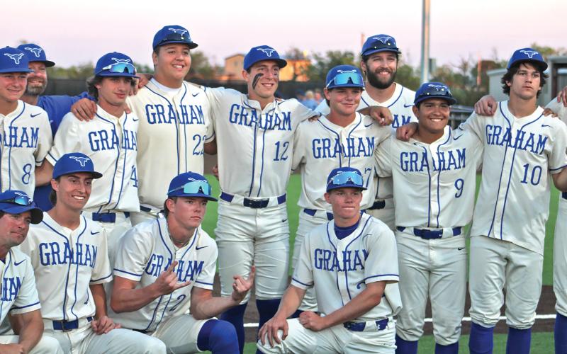 (ALEX HAVARDANSKY | THE GRAHAM LEADER) The Steers celebrate after winning the series 2-1 over the Lubbock Cooper Liberty Patriots in their bi-district matchup in May. The Steers ended up advancing to the regional finals where they fell to Brock.