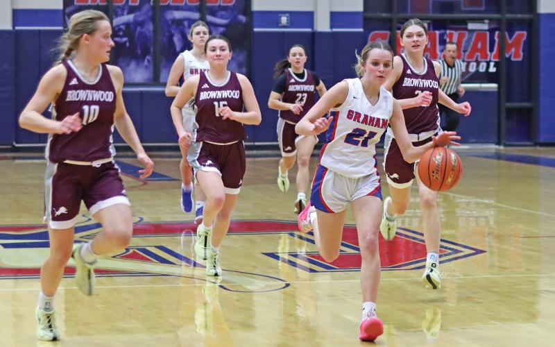 (THOMAS WALLNER | THE GRAHAM LEADER) Bentleigh Martin runs down the court to make a shot at the net during the Lady Blues game Friday, Jan. 31 against the Brownwood Lady Lions. The team put up a fight but ultimately fell 23-46 in the senior night game.