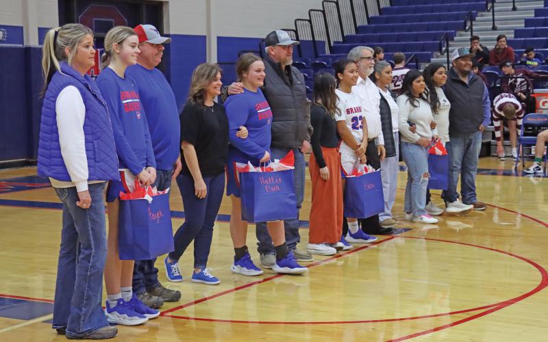 (THOMAS WALLNER | THE GRAHAM LEADER) Lady Blues basketball seniors were honored following the end of their home game Friday, Jan. 31 against the Brownwood Lady Lions. Seniors Fayth Bryer, Rebecca McGregor, Hallie Gough and Ariana Baeza were led out by their parents and guardians and honored by their teammates and the community.