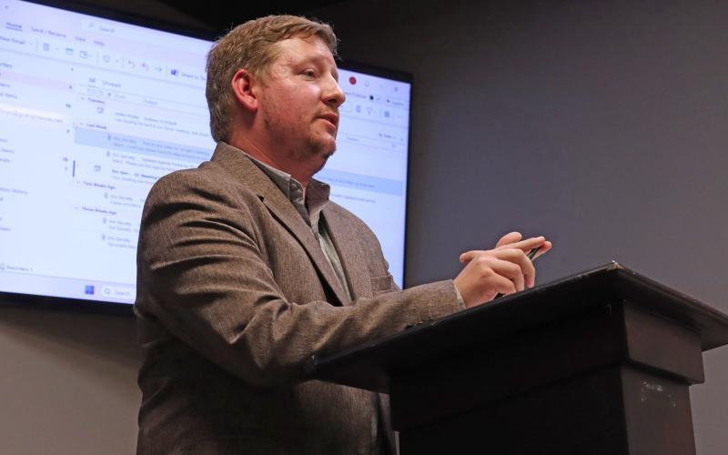 (THOMAS WALLNER | THE GRAHAM LEADER) Dalton Aiken with Public Management Inc. goes over aspects of the planning process for the city comprehensive plan. The city will work with the company along with others to develop a plan for the future of Graham.