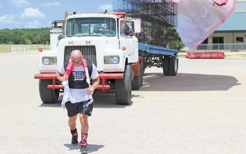 (ARCHIVE PHOTO | THE GRAHAM LEADER) Kris Rotonda, of the Jordan’s Way animal charity, pulls an 18-wheeler truck in 2024 around the Young County Arena parking lot over in an effort to raise money to get the Humane Society of Young County a new transport vehicle.