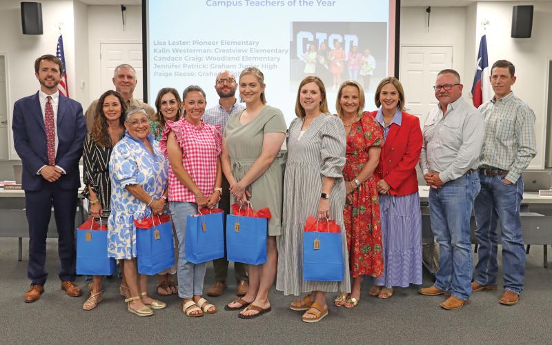 (THOMAS WALLNER | THE GRAHAM LEADER) The Graham ISD Board of Trustees recognized its teachers of the year during their meeting Wednesday, May 14. The teachers were Lisa Lester, Kalin Westerman, Kandice Craig, Jennifer Patrick and Paige Reese.
