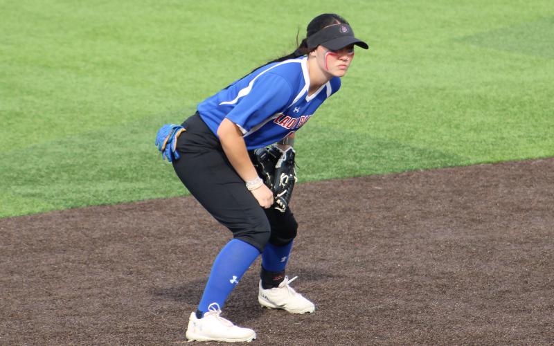 (ALEX HAVARDANSKY | THE GRAHAM LEADER) Hannah Mason lined up at the ready defensively at shortstop for the Lady Blues in their matchup Tuesday, April 1. The team despite having some struggles in the field kept themselves within range of a comeback.