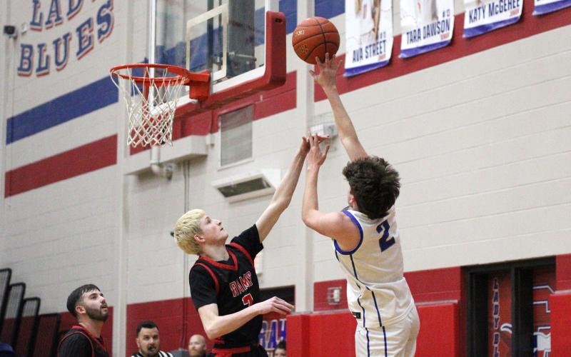 (ALEX HAVARDANSKY | THE GRAHAM LEADER) Bryce Martin puts up a one handed shot Tuesday, Feb. 10 against the Mineral Wells Rams. Martin along with his teammate Jagger Nees set the tone in the first quarter of the Steers’ 58-37 win to clinch a playoff spot. 