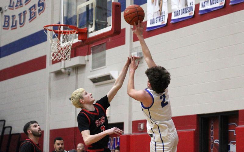 (ALEX HAVARDANSKY | THE GRAHAM LEADER) Bryce Martin puts up a one handed shot in one of the Steers’ previous matchups. The Martin brothers have been effective scorers for the Steers and will need to continue that going into the postseason. 