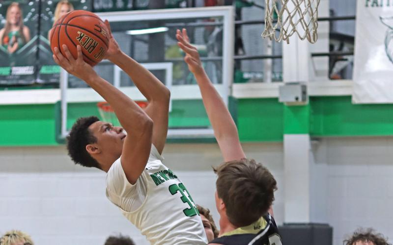 (THOMAS WALLNER | THE GRAHAM LEADER) Jacob Omundi has been an asset for the Bobcats team all season, utilizing his skills to bring crucial points on the board. Omundi led a dominating charge for Newcastle during their most recent matchup Tuesday, Feb. 4 against Woodson, with 18 points overall.