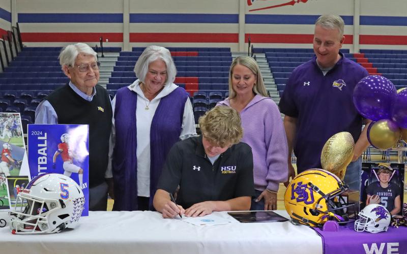 (THOMAS WALLNER | THE GRAHAM LEADER) Harison Brockway signs to play football for Hardin-Simmons University during a Graham High School athletes signing ceremony Wednesday, Feb. 5.