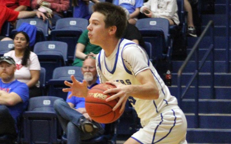 (ALEX HAVARDANSKY | THE GRAHAM LEADER) Jagger Nees pushes the ball up the floor Friday, Feb. 13 against the Glen Rose Tigers. Nees scored four points in the Steers Matchup against Glen Rose. 