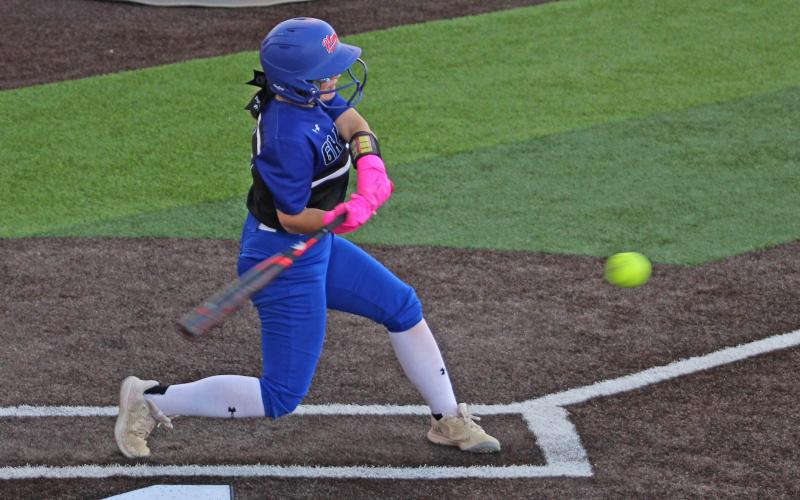 (ALEX HAVARDANSKY | THE GRAHAM LEADER) Kylie Pruitt swings at a ball in one of the Lady Blues’ previous matchups. Despite a loss Monday, Feb. 23 to Peaster, the offense for Graham was electric, putting up 14 runs in the game. 
