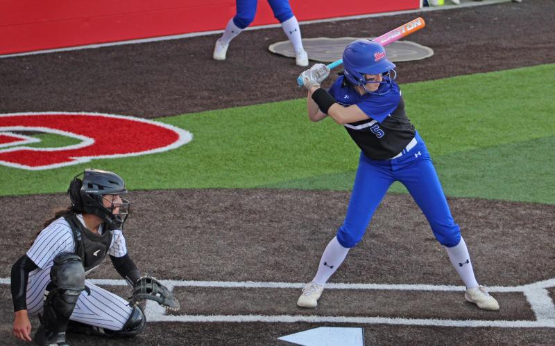 (ALEX HAVARDANSKY | THE GRAHAM LEADER) Hadleigh Allen prepares to swing at a ball in one of the Lady Blues’ previous matchups. Allen had a breakout performance Monday, Feb. 23 against Peaster, driving in four runs.  