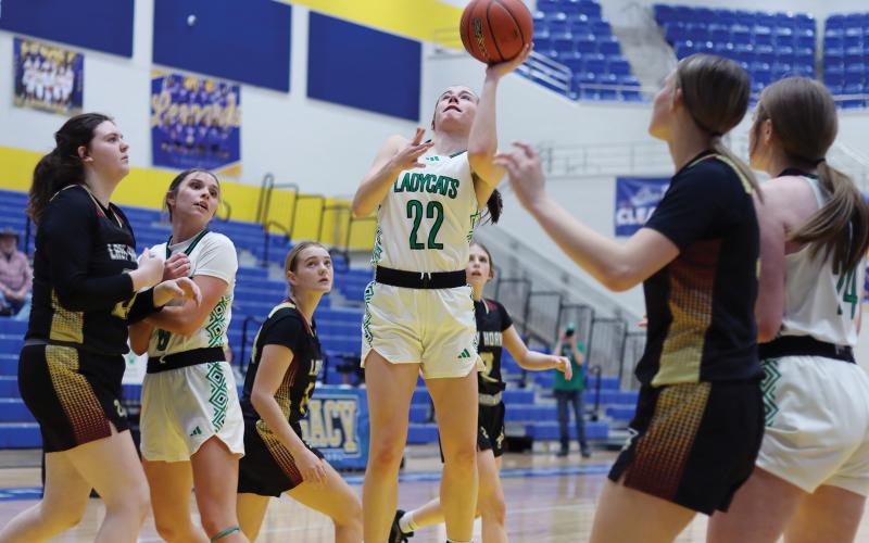 (ARCHIVE PHOTO | THE GRAHAM LEADER) Mattie Dollar runs past the Forestburg defense to make a shot near the net during the game Monday, Feb. 10.  The team moved onto the next round Thursday, Feb. 13, where the brought another victory over the Dodd City Lady Hornets and were crowned area champions.