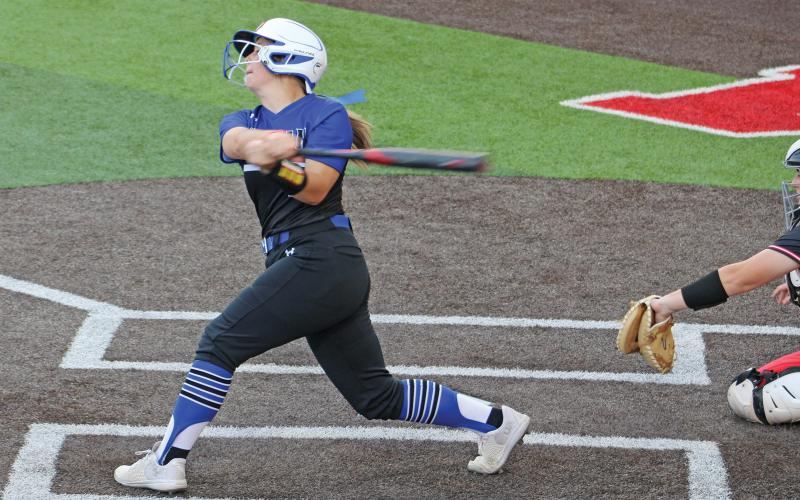 (ALEX HAVARDANSKY | THE GRAHAM LEADER) Ruby Shaffer takes a swing at a ball up at the plate Tuesday, April 1 in Graham’s matchup against Mineral Wells. Shaffer had a very busy day this day playing in both the JV and varsity games.