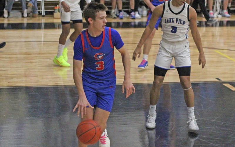 (ALEX HAVARDANSKY | THE GRAHAM LEADER) Jagger Nees takes the ball up the floor Tuesday, Feb. 24 against the San Angelo Lake View Chiefs. Nees was an effective distributor of the ball in the Steers’ 38-32 bi-district playoff win. 