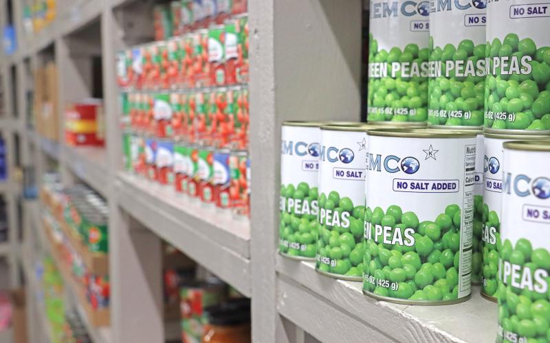 (ARCHIVE PHOTO | THE GRAHAM LEADER) Cans of food line the shelves of the Graham Food Pantry in 2024 located at 601 Indiana St. The food pantry has seen an uptick in clients and last month distributed approximately 26,000 pounds of food.