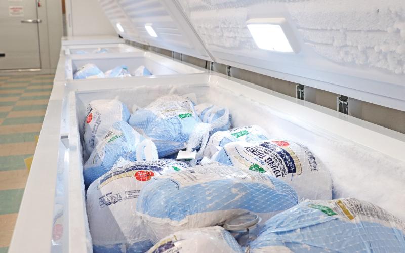 (THOMAS WALLNER | THE GRAHAM LEADER) Frozen turkeys fill up four freezers at the Graham Crisis Center food pantry. Clients of the food pantry have increased recently causing the organization to adjust to the needs of the community.