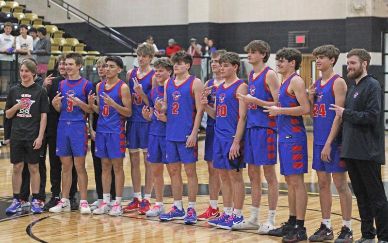 (ALEX HAVARDANSKY | THE GRAHAM LEADER) The Steers pose after their bi-district matchup Tuesday, Feb. 24 against the San Angelo Lake View Chiefs. For the first time in seven years, the Steers won a playoff game with a 38-32 victory. 