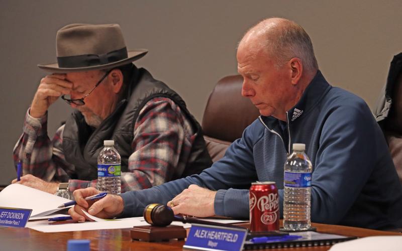 (ARCHIVE PHOTO | THE GRAHAM LEADER) Members of the Graham City Council listen to members of the public and City Manager Eric Garretty speak on the budget during discussions earlier this year. The city council has approved readings of proposed increases to the property tax rate and water and sewer rates.