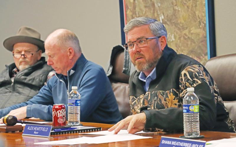 (ARCHIVE PHOTO | THE GRAHAM LEADER) Mayor Alex Heartfield, at right, speaks at a budget workshop Thursday, Feb. 13. The Graham City Council were presented budget data Thursday, April 10 by City Manager Eric Garretty. The council will meet Thursday, April 24 and establish a budget planning calendar. 
