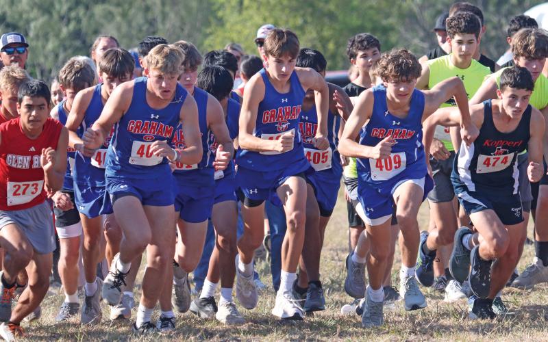 (KYLIE BAILEY | THE GRAHAM LEADER) The Graham Steers varsity cross country team takes off Wednesday, Sept. 10, in the Glen Rose Invitational. The team finished seventh as a whole out of 13 teams in the three mile run. 