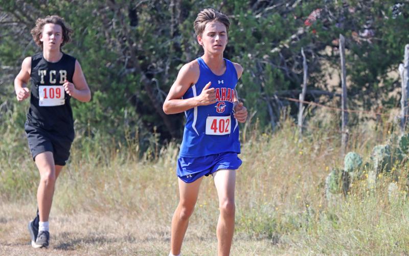 (KYLIE BAILEY | THE GRAHAM LEADER) Dayne Dunnam makes his way around the Glen Rose Invitational course Wednesday, Sept. 10. Dunnam finished 26 in the three mile run. 