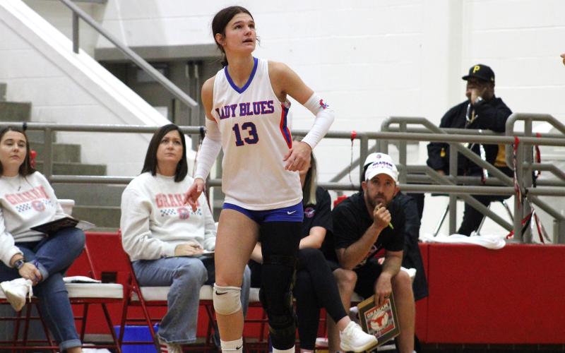 (ALEX HAVARDANKSY | THE GRAHAM LEADER) Tara Dawson prepares in the back row Friday, Oct. 24, against the Mineral Wells Lady Rams. Dawson is a veteran leader for this team but also a versatile playmaker offensively and defensively. 