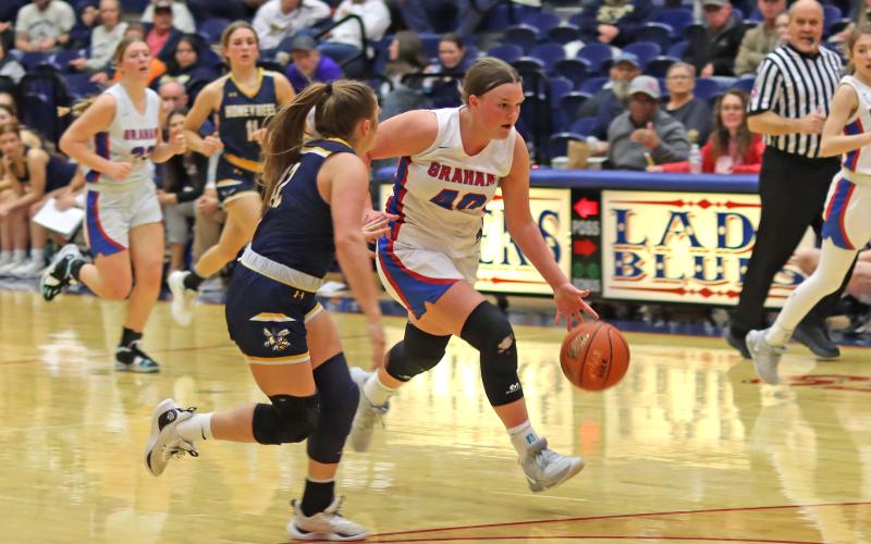 (THOMAS WALLNER | THE GRAHAM LEADER) Addyson Weaver (40) dribbles the ball up the court on a fastbreak attempt during Graham’s game Friday, Jan. 26 against Stephenville. The Lady Blues took a 49-25 loss to the Honeybees.