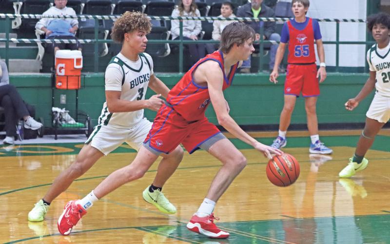 (TC GORDON | THE GRAHAM LEADER) Graham post player Nikolas Wankowicz begins his dribble at the free throw line as he looks to drive to the basket for a layup during a game earlier this season.