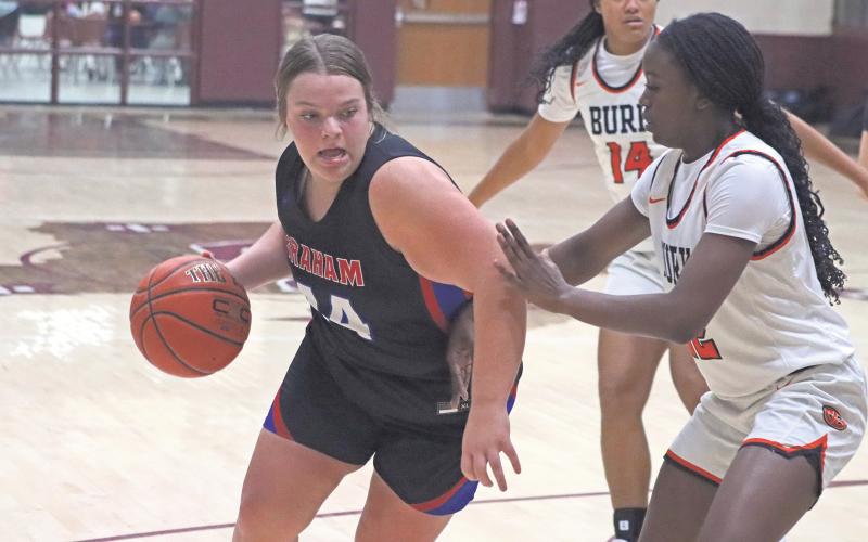 (ARCHIVE PHOTO | THE GRAHAM LEADER) Lady Blues senior Hallie Gough has been a player who has always made a spark on the court and during the game Tuesday, Dec. 17, assisted with a close win over Graford. As one of the team's post players, Gough plays a crucial role for the Lady Blues.