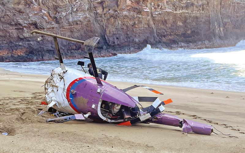 (CONTRIBUTED PHOTO | SHANA WOLFE) The wreckage of a helicopter that had to make a forced landing Tuesday, Feb. 27 off the shores of shores of Kauai, Hawaii. The aircraft experienced engine issues and made a forced landing, according to a Federal Aviation Administration preliminary incident report.