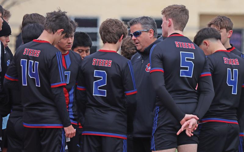 (THOMAS WALLNER | THE GRAHAM LEADER) Steers head coach Tim Wankowicz speaks with the team during their match against the Bridgeport Bulls at home Feb. 21, 2025. The Steers rallied but ultimately fell in a penalty shootout.