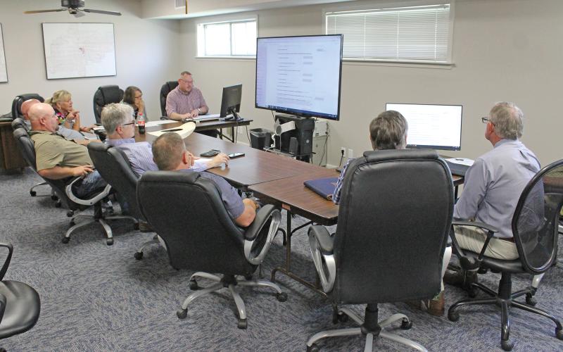 (TC GORDON | THE GRAHAM LEADER) Young County Commissioners and courthouse staff met Monday, Aug. 5 at the Young Central Appraisal District to go through the tax worksheet to come up with the proposed rate.
