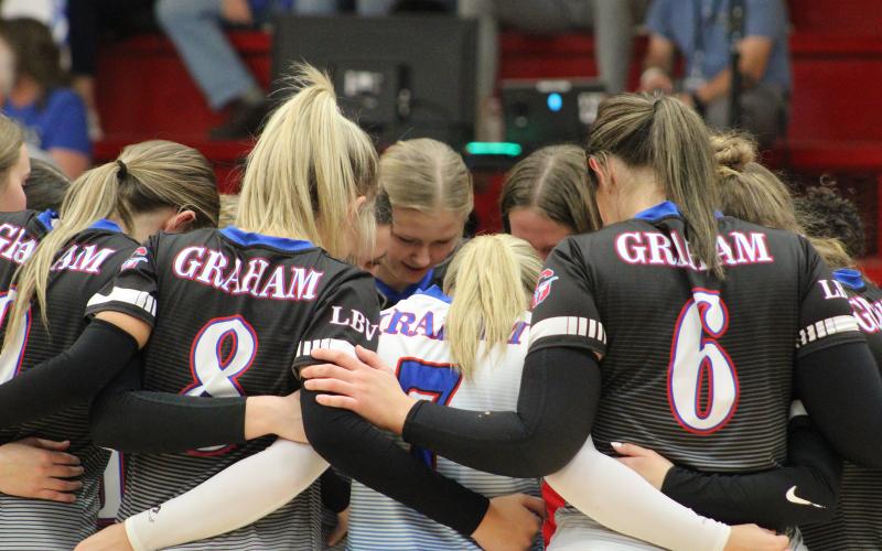 (ALEX HAVARDANSKY | THE GRAHAM LEADER) The Lady Blues huddle prior to their Bi-District matchup Thursday, Oct. 30, against the Frenship Memorial Lady Panthers. The Lady Blues lost this matchup in three sets ending their season.