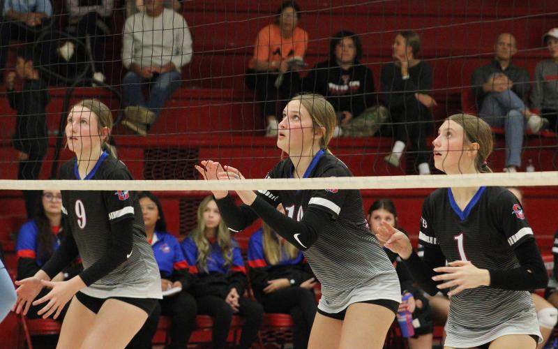 (ALEX HAVARDANSKY | THE GRAHAM LEADER) Rylee Moore, 9, Emily Hughes, 10, and Katy McGehee, 1, line up in the front row Thursday, Oct. 30, against the Frenship Memorial Lady Panthers. Head coach Marci Faulk praised the team for being able to play multiple positions and gain experience throughout the years. 
