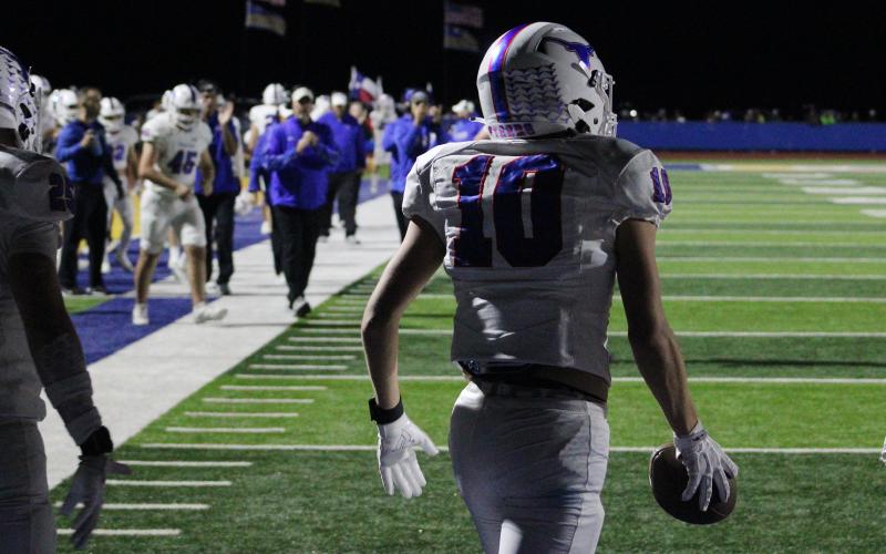 (ALEX HAVARDANSKY | THE GRAHAM LEADER) Brodie Martin runs back to the huddle after catching a touchdown pass Friday, Oct. 31, against the Brock Eagles. Martin had the lone touchdown on the night in the Steers’ 28-7 loss.