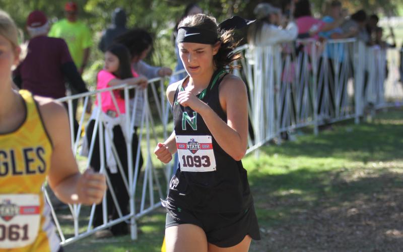 (Wharton County Leader-Journal) Ladycat Reese Ribble dashes through the course at the state cross country meet Friday, Oct. 31. Ribble finished the day in 129th place out of 145 runners and helped the team end with a top 15 finish. 