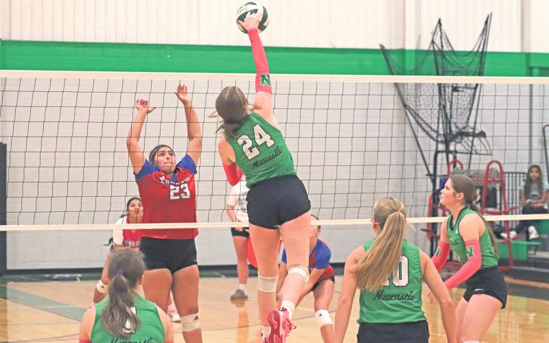 (ARCHIVE PHOTO | THE GRAHAM LEADER) The Ladycats’ Sophie Terrell (24) reaches the peak of her jump and makes contact with the ball Oct. 5, 2024 during Newcastle’s final non-district game, a 3-0 sweep over Knox City.