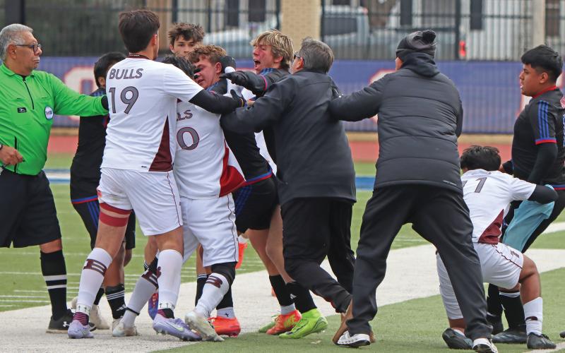 (THOMAS WALLNER | THE GRAHAM LEADER) Members of the Graham Steers and Bridgeport Bulls get into an altercation Friday, Feb. 21 which was broken up by teammates, officials and the Graham coaching staff. 