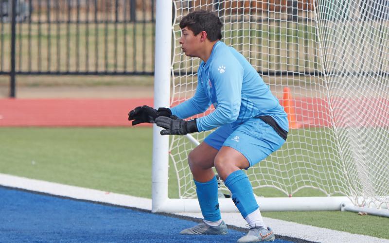 (THOMAS WALLNER | THE GRAHAM LEADER) Graham’s goalie Ozzy Trejo focuses on a Bridgeport player attempting a shot during a penalty shootout Friday, Feb. 21. The Steers fell 8-9, but rallied and put up a fight at home.