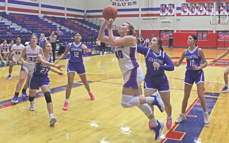 (ARCHIVE PHOTO | THE GRAHAM LEADER) Graham’s Addyson Weaver puts up a close shot at the beginning of a game earlier in the season. Weaver hauled in a team-high seven rebounds during the Portales game in the Lubbock Cooper Liberty Tournament held last week.