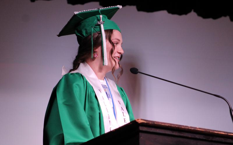 (ALEX HAVARDANSKY | THE GRAHAM LEADER) Class Valedictorian Ashleigh Taylor gives her graduation speech Friday, May 23. Taylor emphasized how you can still do big things even at a small school which she will prove by attending Harvard University in the fall. 