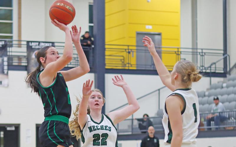 (ARCHIVE PHOTO | THE GRAHAM LEADER) Mattie Dollar attempts a shot near the free throw line during the regional final matchup Friday, Feb. 21 with the Neches Lady Tigers. Dollar was one of two Newcastle athletes chosen for the Big Country Fellowship of Christian Athletes All-Star Festival in June.