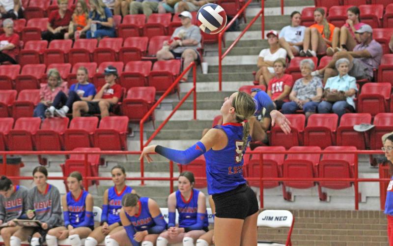 (ARCHIVE PHOTO | THE GRAHAM LEADER) Lady Blues senior Braylee Mayes serves the ball during one of the team’s matches in 2024. Mayes will be competing on the West Texas Team for volleyball at the Oil Bowl Classic. 