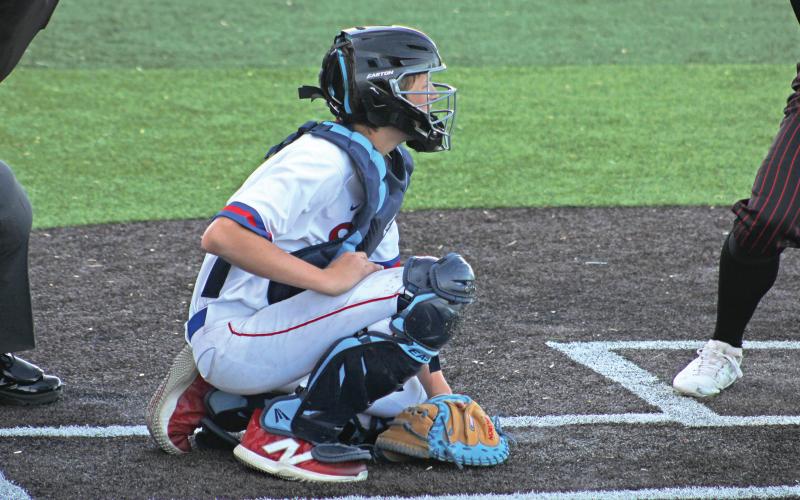 (ALEX HAVARDANSKY | THE GRAHAM LEADER) Colton Doyle behind the plate at catcher for the Steers during their game Tuesday, April 8 against the Rams. The Steers lost to the Rams 9-2 in the contest. 