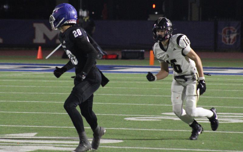 (ALEX HAVARDANSKY | THE GRAHAM LEADER) Jordan Alexander tracks an Eagle Mountain receiver Friday, Nov. 7. Alexander started the game with a pick six down the right sideline to set the tone defensively.