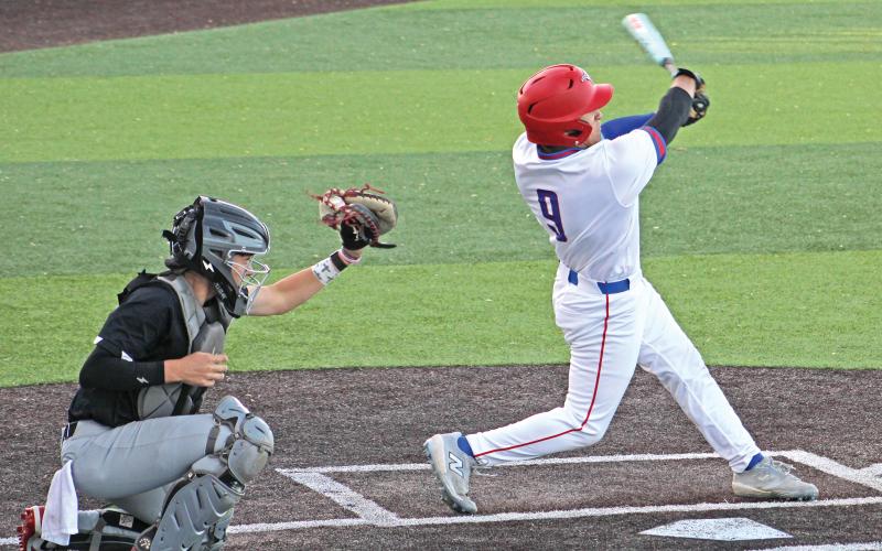 (ALEX HAVARDANSKY | THE GRAHAM LEADER) Mike Garcia takes a swing at a ball Tuesday, April 8 against the Mineral Wells Rams.