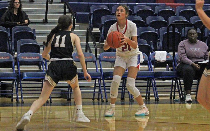 (ALEX HAVARDANSKY | THE GRAHAM LEADER) Addison Gober attempts a three pointer during the Lady Blues matchup Tuesday, Nov. 11. Gober was a pivotal scorer for the Lady Blues in their win over the Haskell Lady Indians.