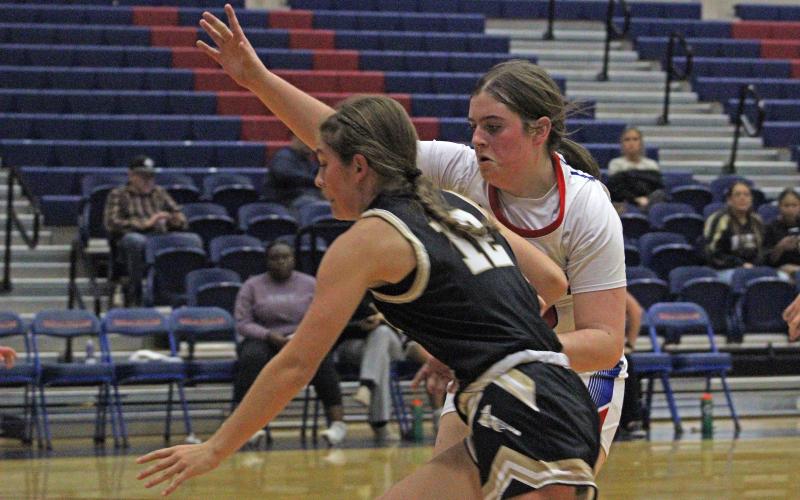 (ALEX HAVARDANSKY | THE GRAHAM LEADER) Landree Smith plays man-to-man defense on a Haskell offensive player Tuesday, Nov, 11. The Lady Blues were great at generating points off of defensive opportunities. 