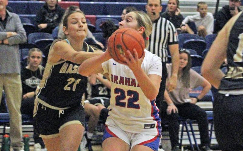 (ALEX HAVARDANSKY | THE GRAHAM LEADER) Adi Pinkston goes up for a midrange jumper Tuesday, Nov. 11 against the Haskell Lady Indians. The Lady Blues stayed undefeated to start the season after taking down the Wichita Falls Legacy Lady Leopards in a blowout victory Saturday, Nov. 15.